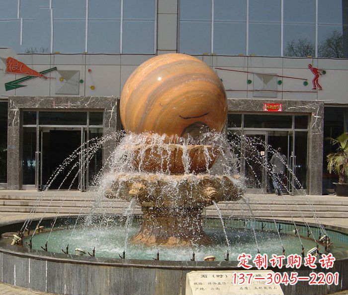 河北石来运转球晚霞红风水球石雕